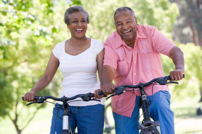 Older couple on bike